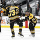 Charlie McAvoy tuulettaa Marchandin kanssa, Boston Bruins